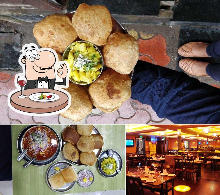 Take a look at the image displaying food and interior at Sujata UpharGraha