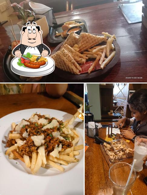 Among different things one can find food and dining table at Toi & Moi