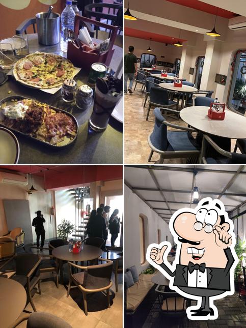 Take a seat at one of the tables at Two Joes Gastro Bar