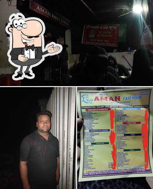 Look at the photo of Aman Fast Food