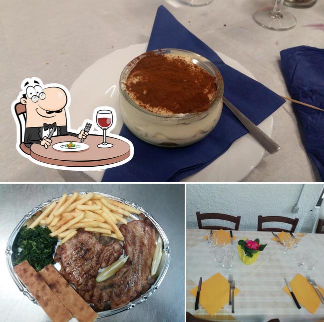 La immagine di cibo e tavolo da pranzo da Ristorante La Frasca