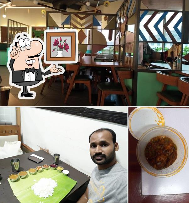 Take a seat at one of the tables at Junior Kuppanna - Forum Mall, Chennai