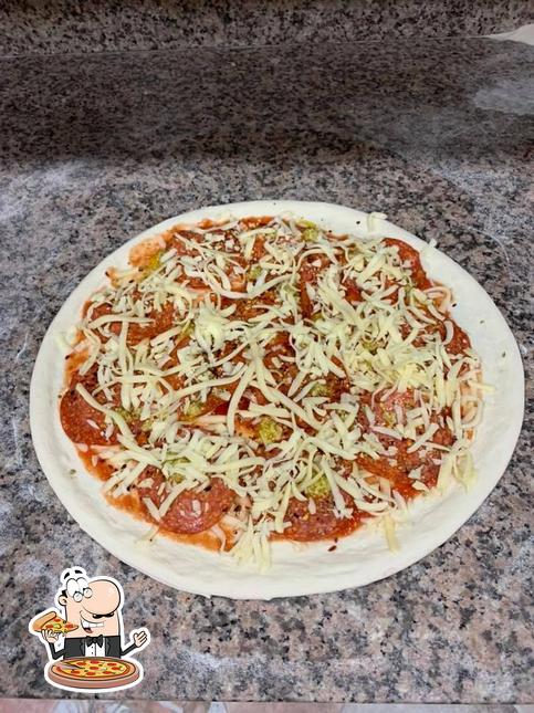 Scegli una pizza a Okrepčevalnica Gedžo