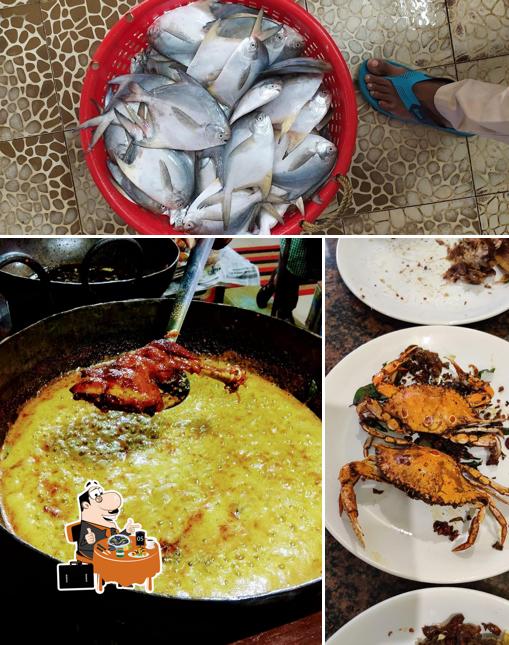 Get seafood at Vizhinjam Family Restaurant