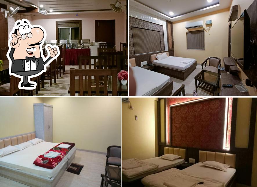 Take a seat at one of the tables at Hotel Diamond Inn - Hotel in Rajgir