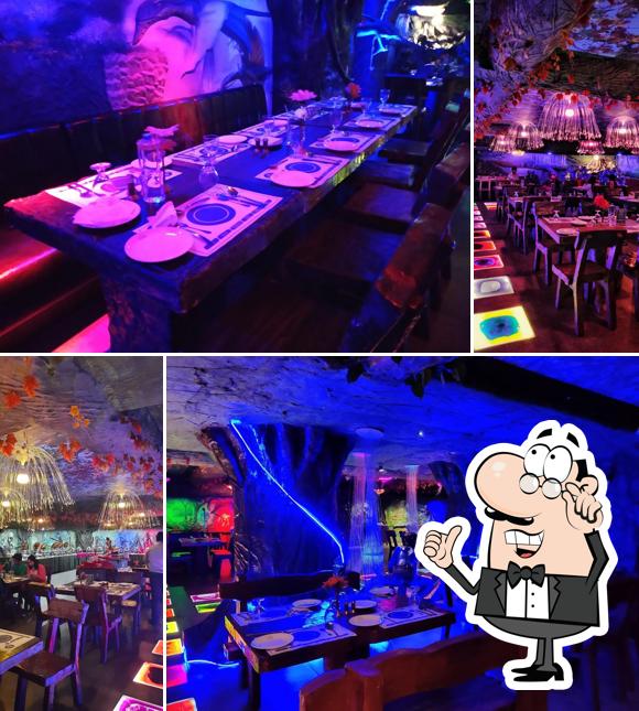 Take a seat at one of the tables at Yazhee World Restaurant