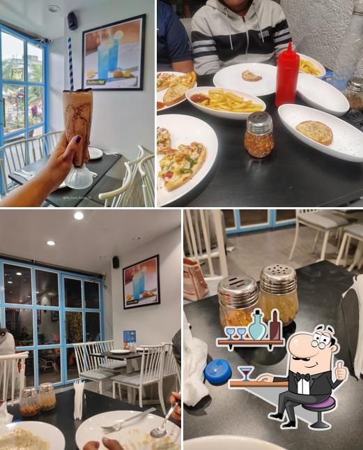 Check out how The Pizza Box & Cafe Sinhagad road Pure Veg looks inside