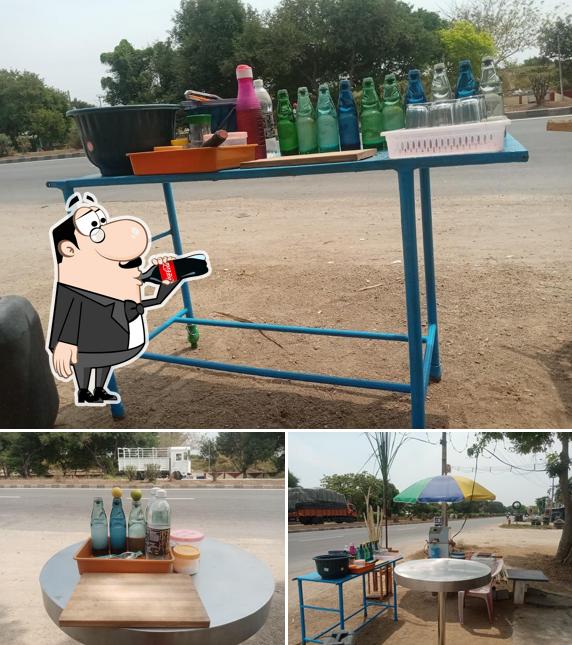 Among different things one can find drink and exterior at SM DHANALAKSHMI CAFE & HOTEL
