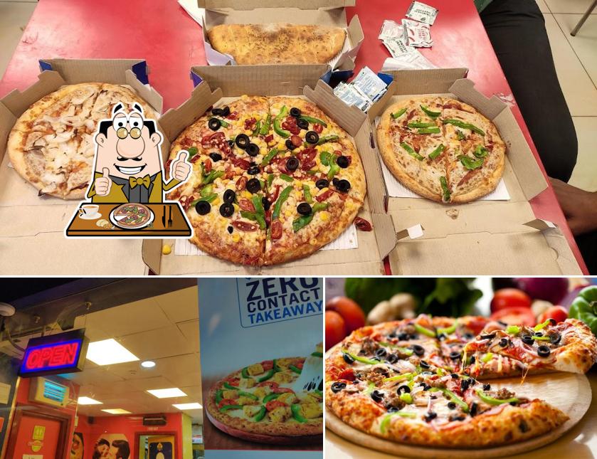 Try out pizza at Domino's Pizza Futi Kothi Circle, INDORE