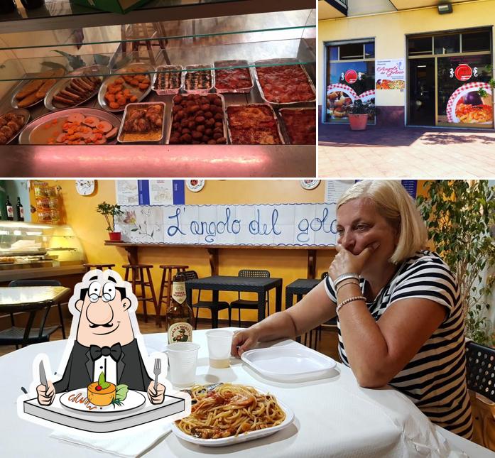 Dai un’occhiata alla immagine che raffigura la cibo e interni di L'angolo del goloso