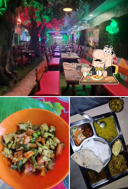 Take a look at the image depicting food and interior at Odia Ruchi