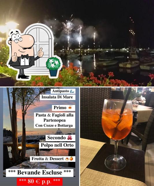 Questa è la foto che mostra la esterno e birra di Ristorante La Battigia