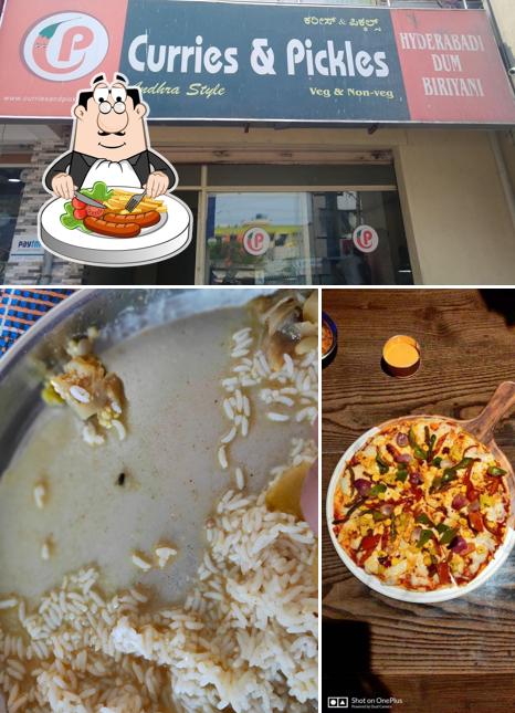 Check out the image showing food and exterior at Curries and Pickles
