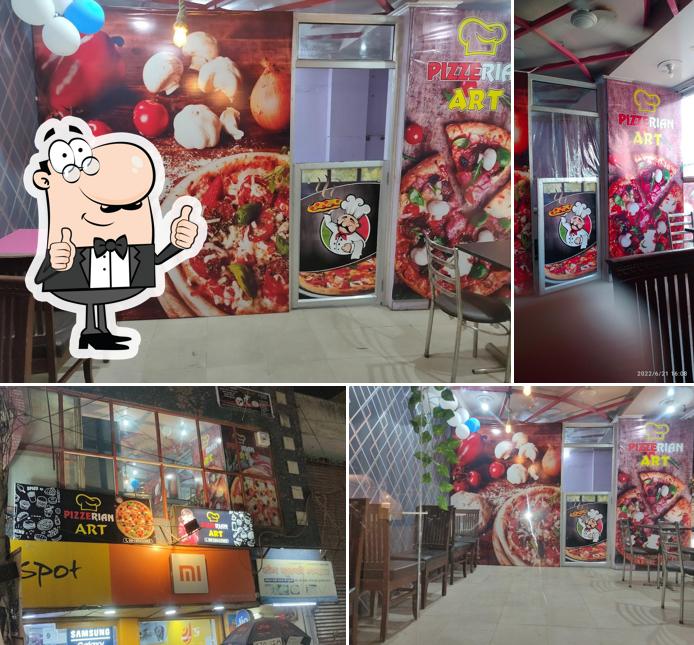 Look at this photo of Pizzerian art