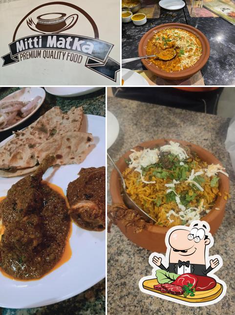 Get meat dishes at Mitti Matka Hotel