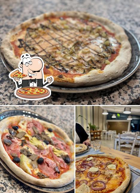 Prenditi una pizza a Pizzeria Fuoco e Pietra