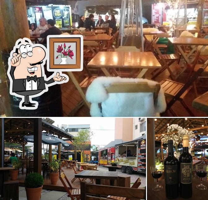 Entre diferentes coisas, interior e vinho podem ser encontrados no Meu Jardim Food Park Kobrasol