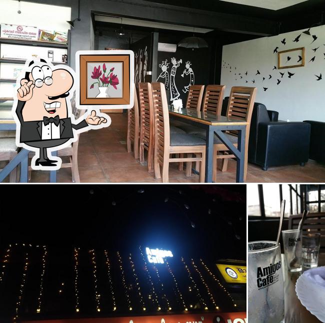 Take a seat at one of the tables at Biriyani Cafe