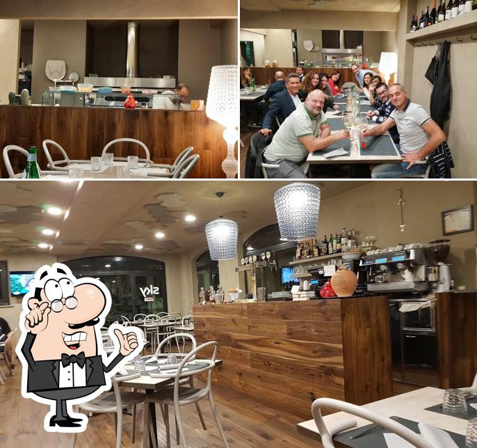 Siediti a un tavolo di Ristorante Pizzeria Dejavu