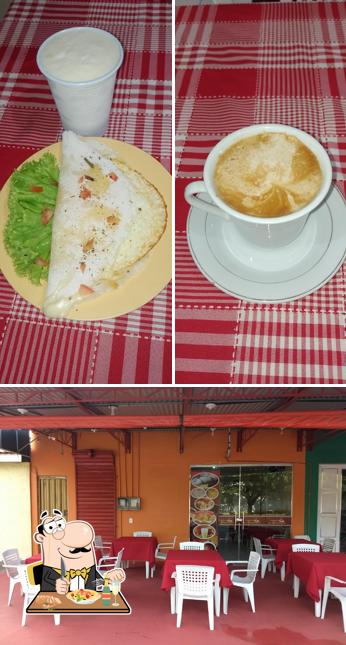 Esta é a imagem mostrando comida e interior a Pizzaria Nova Aliança
