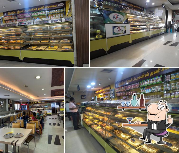 Take a seat at one of the tables at Adyar Ananda Bhavan - A2B