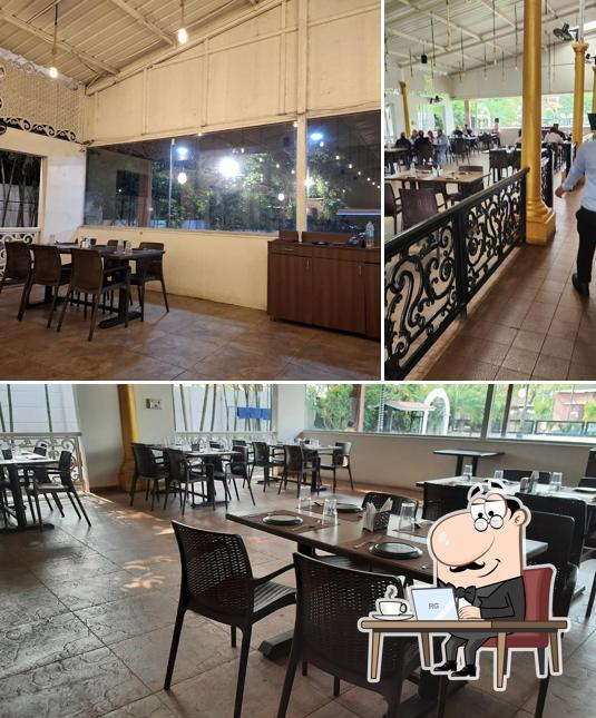 Take a seat at one of the tables at The Zaffran Restaurant, Nashik