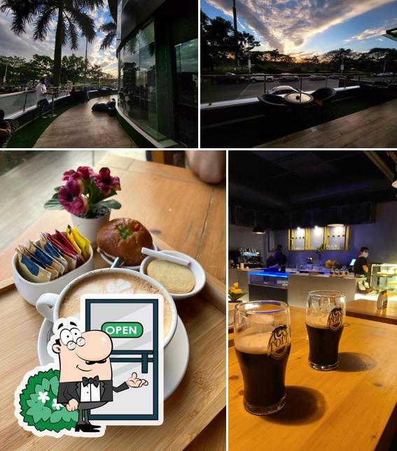 Check out the photo displaying exterior and drink at 91 Palm Beach Cafe