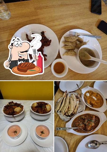 Order meat dishes at Feed Me Cafe