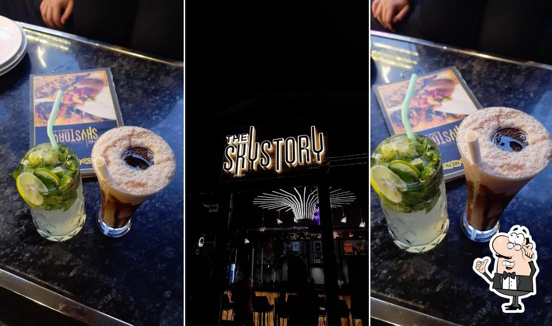 The interior of The Sky Story Luxury Lounge - Rooftop Glasshouse Skydine Cafe