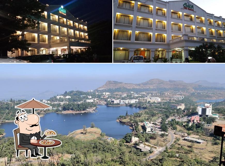 The outside part is an important feature of Shilpi Hill Resort - Restaurant Hotel Swimming Pool Lake View Room Suites