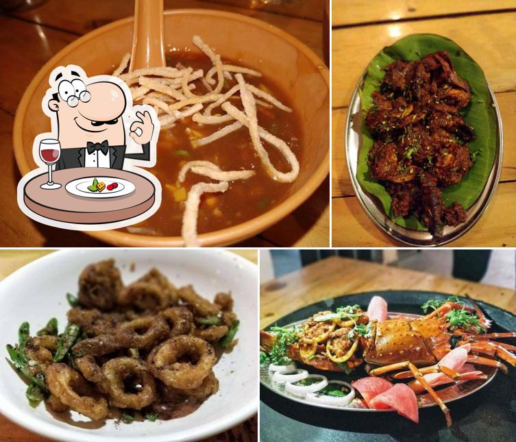 Hot and sour soup and chicken wings at Malvan Samudraa