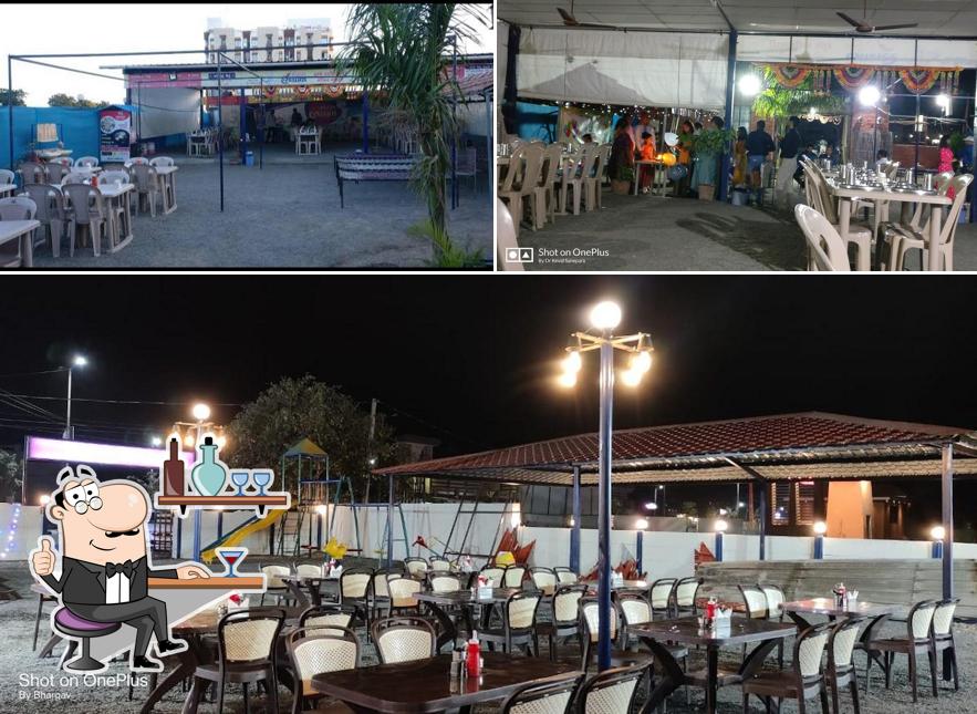 Take a seat at one of the tables at Rasthal Restaurant