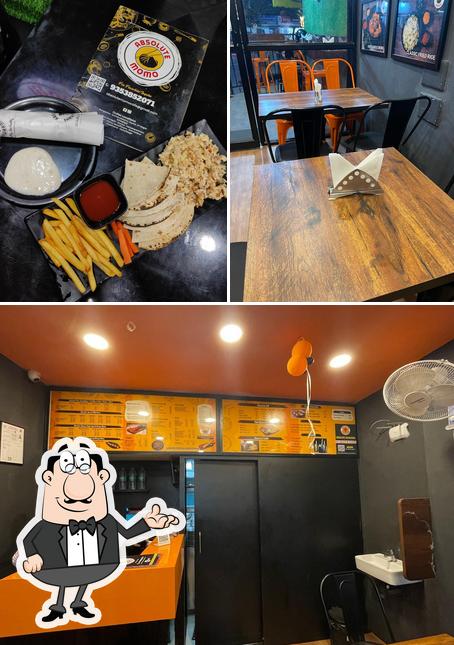 Take a look at the photo displaying interior and food at Absolute Shawarma & Momo Cafe