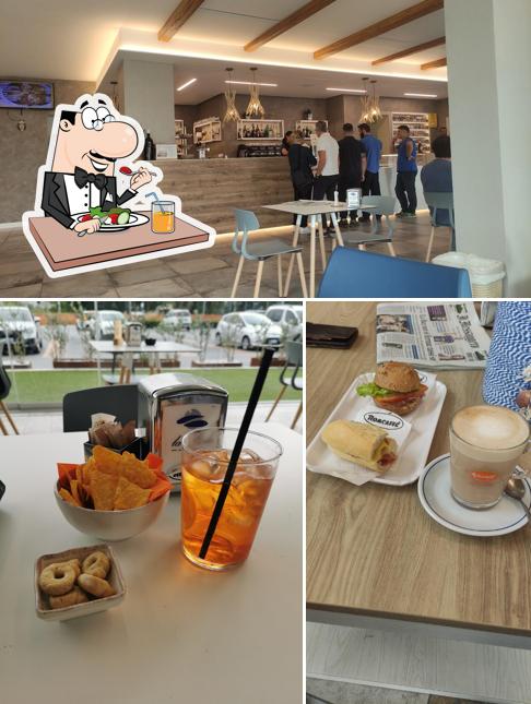 Tra le diverse cose da La Perla Bar Pizzeria Ristorante si possono trovare la cibo e interni