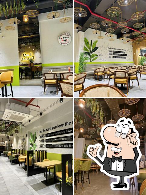 The interior of Lord Petrick Coffee & Burger-Prahlad Nagar, Ahmedabad