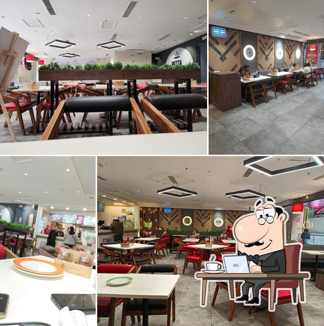 The interior of Pizza Hut DLF South Square Mall Sarojini Nagar, Delhi