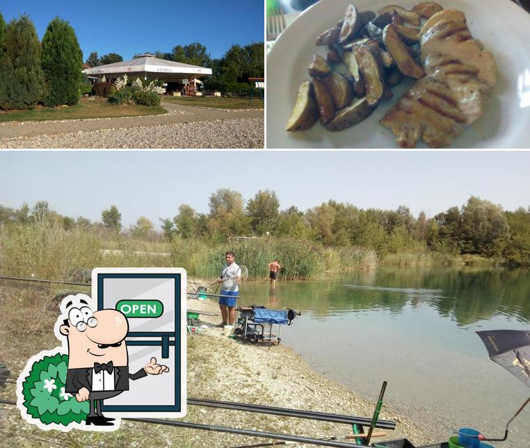 La foto della esterno e pesce di Restoran Aquacity