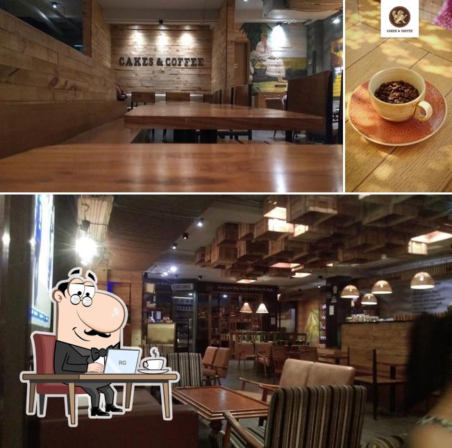 Take a seat at one of the tables at Cakes & Coffee