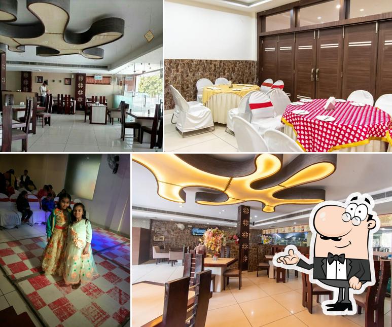 Take a seat at one of the tables at Khana Khazana