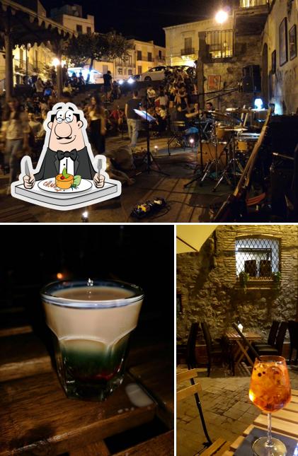 Dai un’occhiata alla foto che presenta la cibo e esterno di Pachamama Wine-Bar