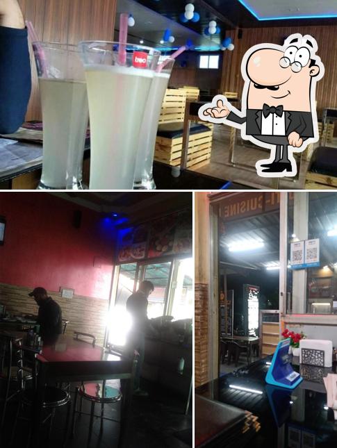 This is the photo displaying interior and beverage at The Chauhan's Multi-Cuisine family Restaurant