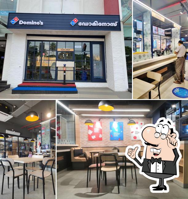 Take a seat at one of the tables at Domino's Pizza Kannur Central Mall, Kannur