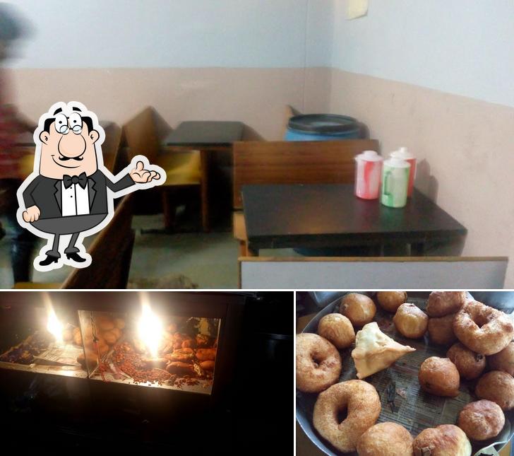 The photo of interior and food at Aditya Mess