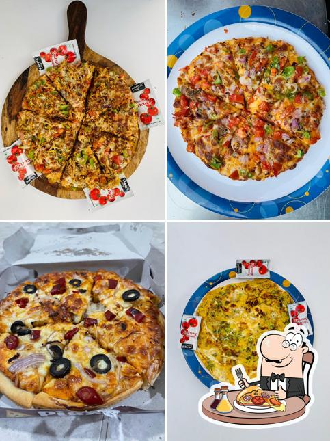 Try out pizza at Durga's