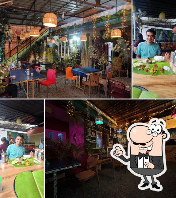 The interior of TUSKER CAF'E Restaurant Thekkady