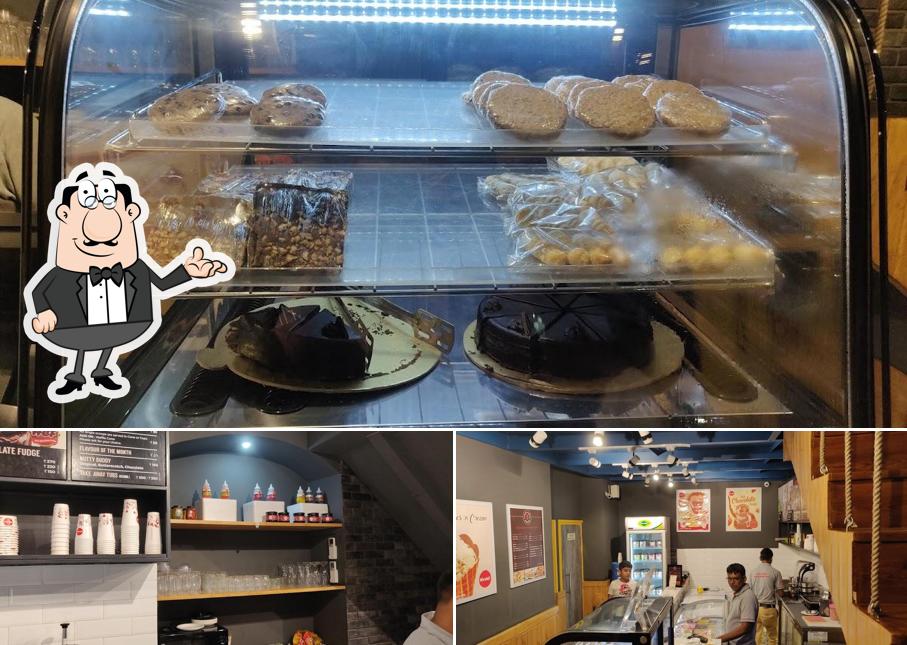 Take a seat at one of the tables at Nirula's Hazratganj