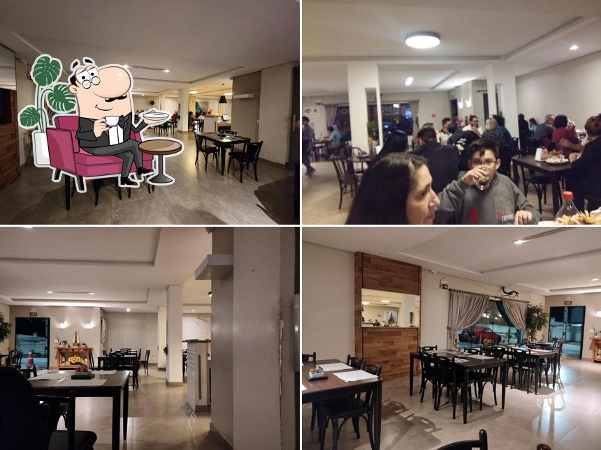 O interior do Pizzaria Donna Pizza