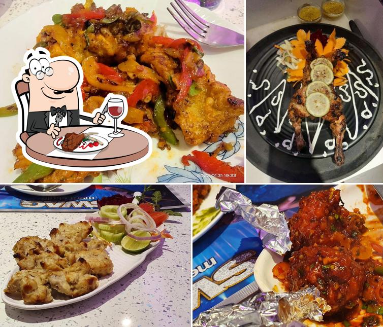 Order meat dishes at Oasis 69 Restaurant Cum Bar
