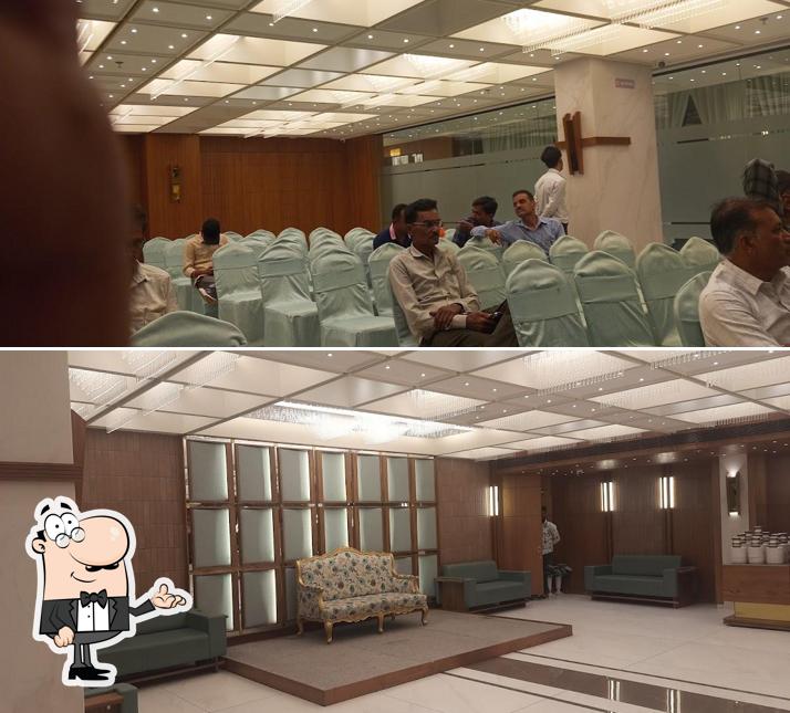 Take a seat at one of the tables at Tasty Meals Restaurant and Banquet