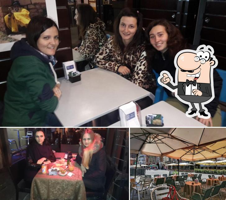 Dai un'occhiata agli interni di Mid Way Cafè 900